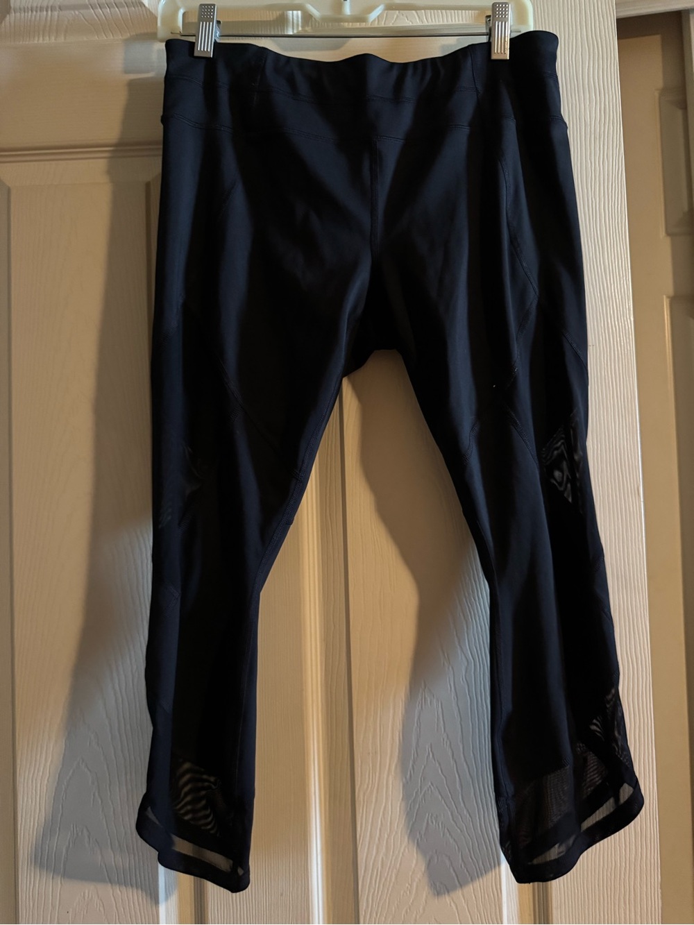 Athleta- Black High Impact Running Capri with Mesh Detailing